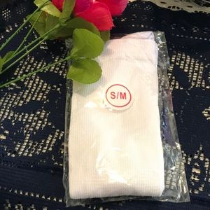 Never worn white pressure knee highs.  Great for work and airplane flights!